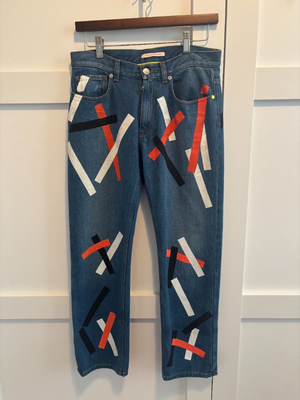 Christopher Kane Jeans with strips of black, white and orange paint (#101)